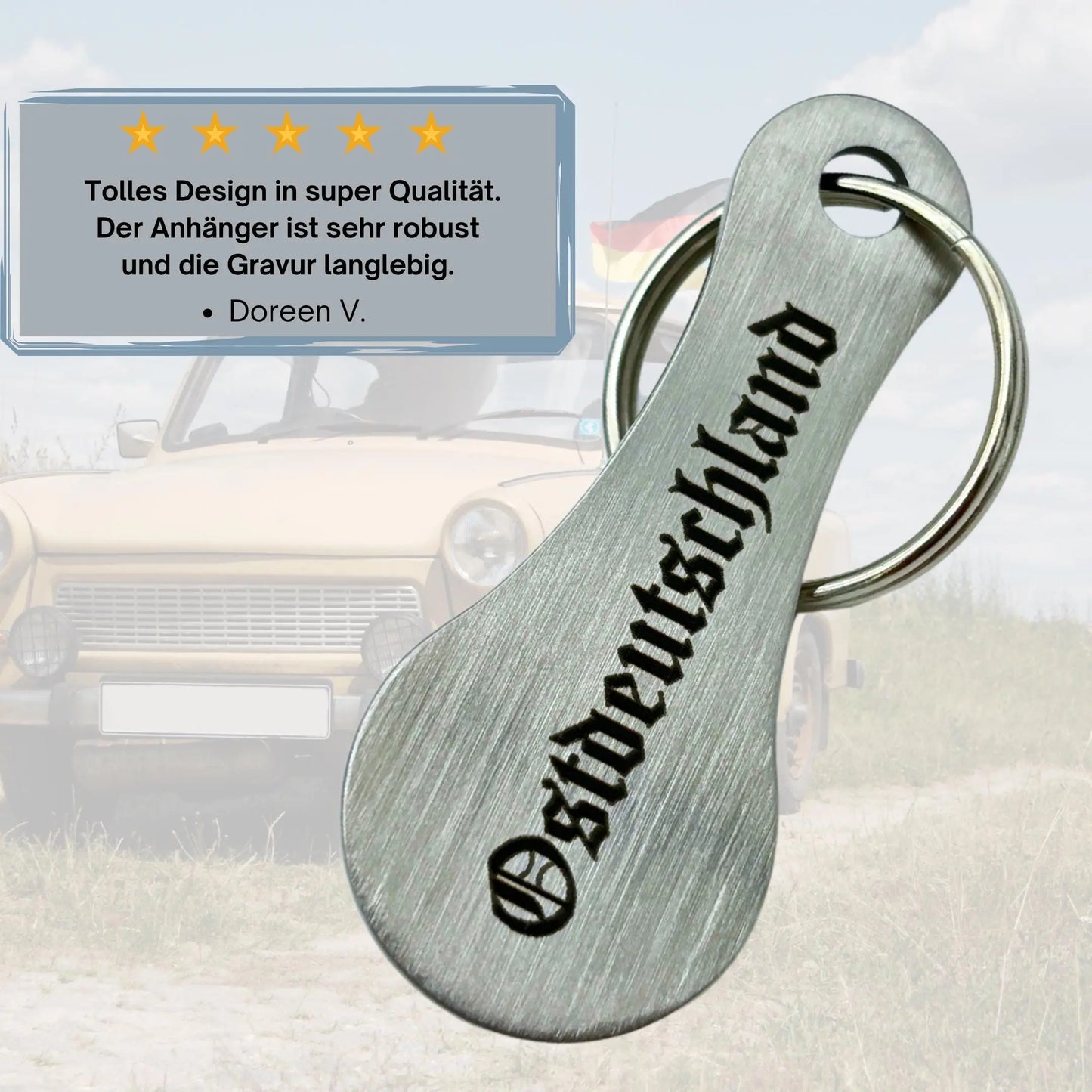 Einkaufswagenlöser „Ostdeutschland“ aus Edelstahl mit Kundenbewertung vor Trabant