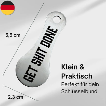 Kompakter Einkaufswagenlöser aus Edelstahl mit Gravur "Get Shit Done" – handlich mit 5,5 x 2,3 cm, perfekt für den Schlüsselbund