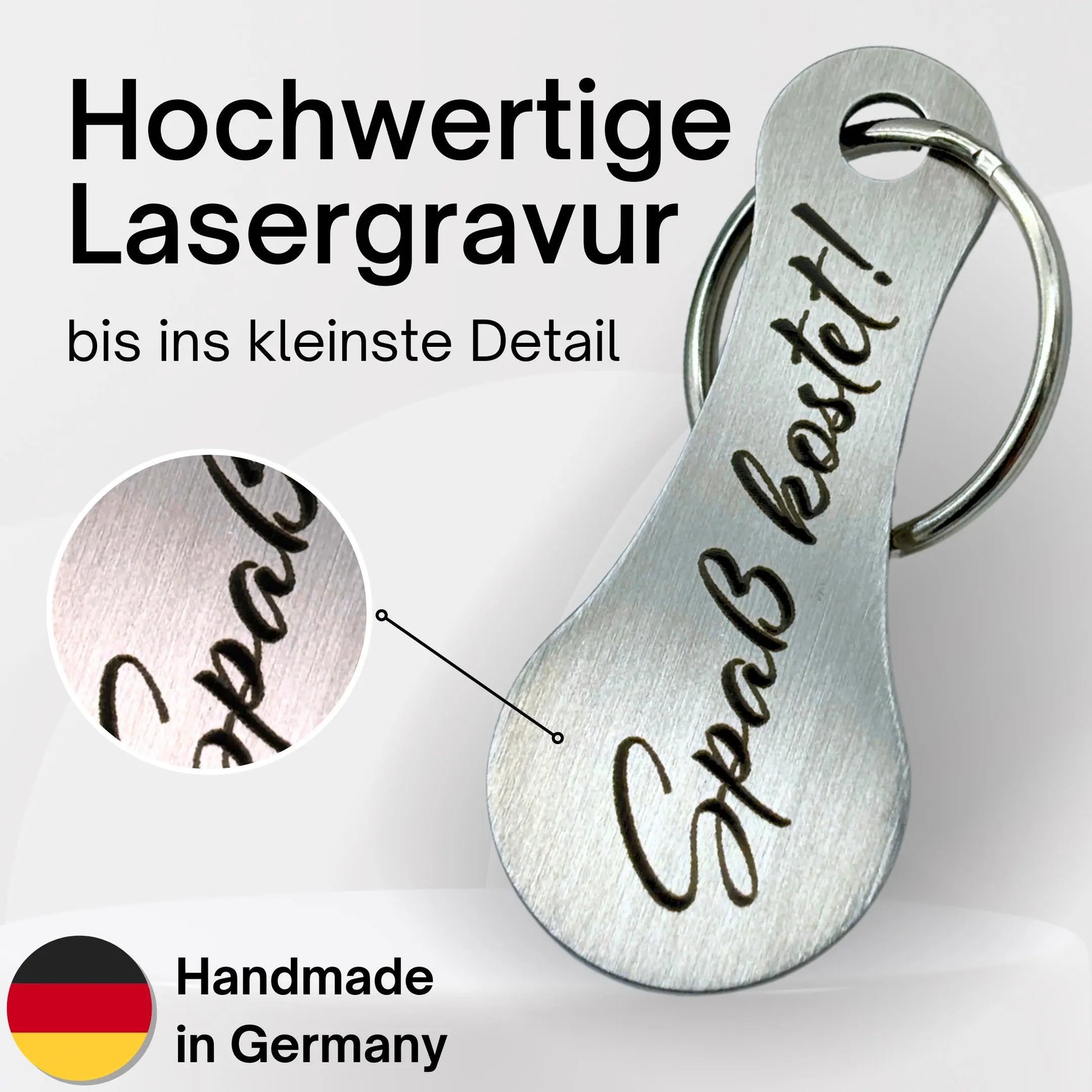 Detailaufnahme Lasergravur „Spaß kostet!“ – Einkaufswagenlöser aus Metall