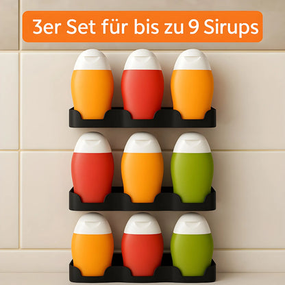 Drei Zerup Halterungen für insgesamt bis zu neun Sirupflaschen an der Küchenwand